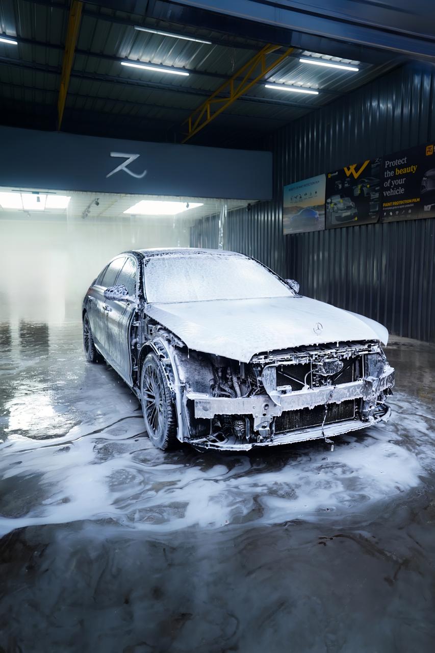 Mercedes S-Class covered in snow foam in the Z Lab Design wash bay