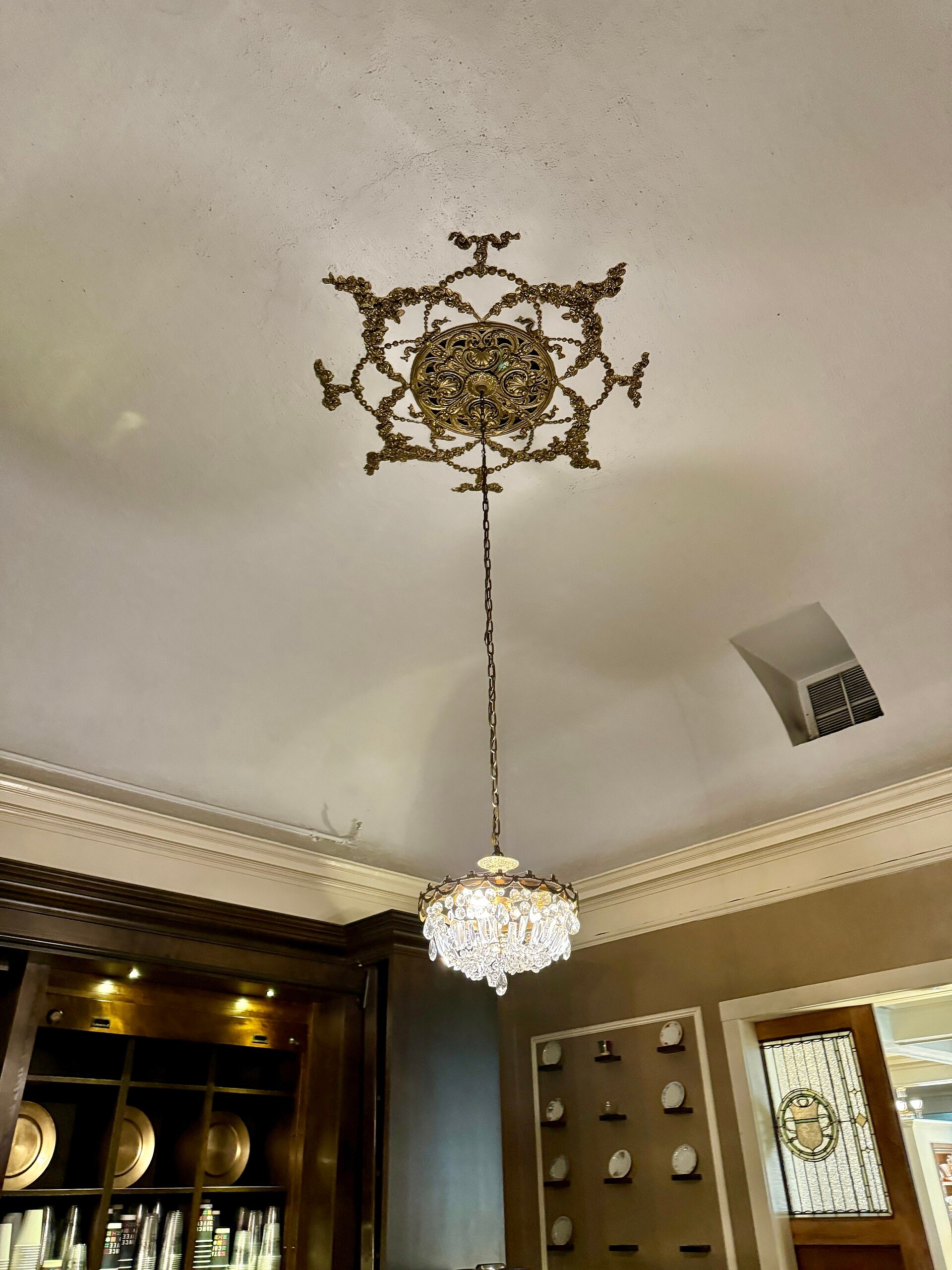 Antique crystal chandelier in the dining hall