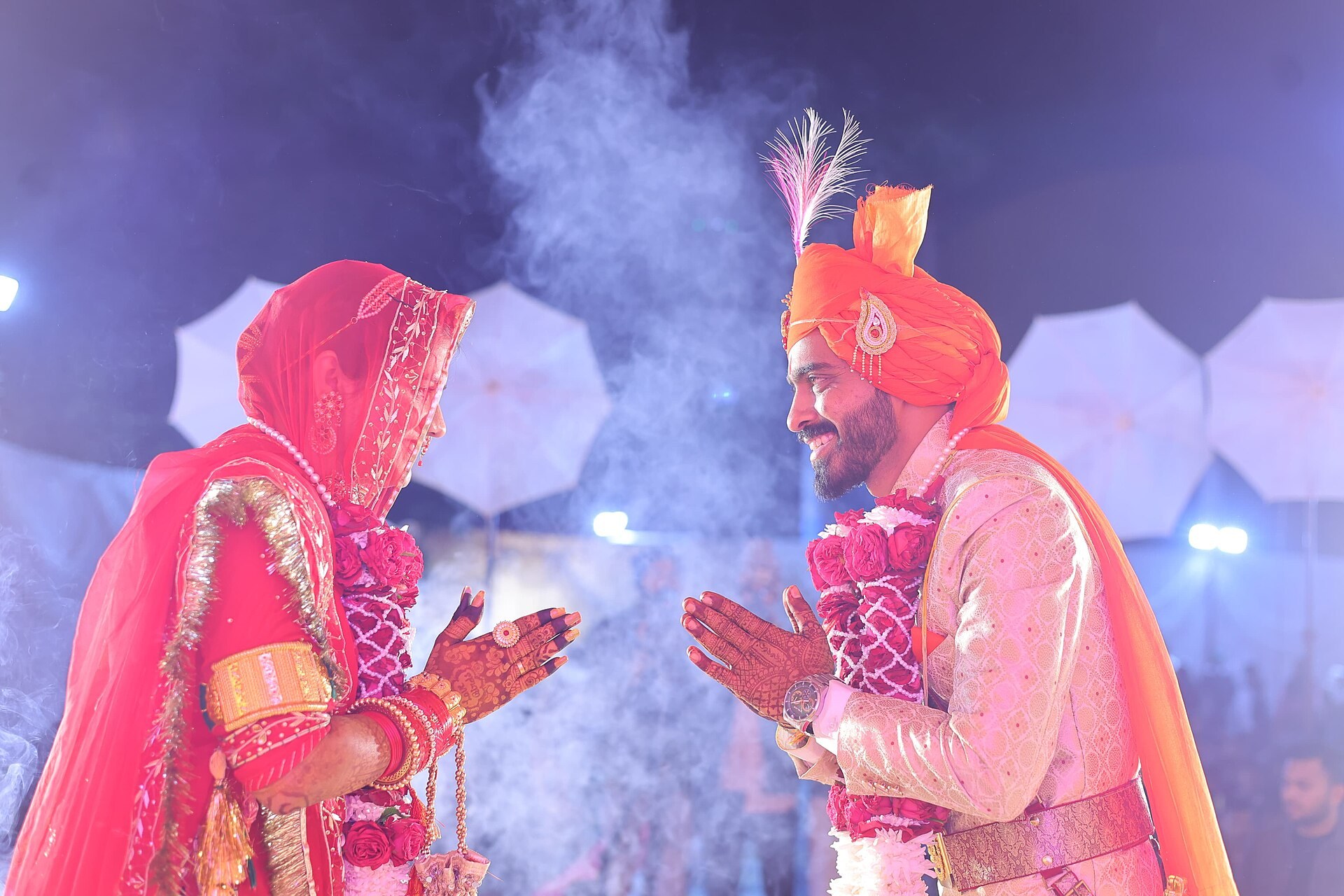 Bride and groom exchanging vows at a Rajasthani wedding ceremony